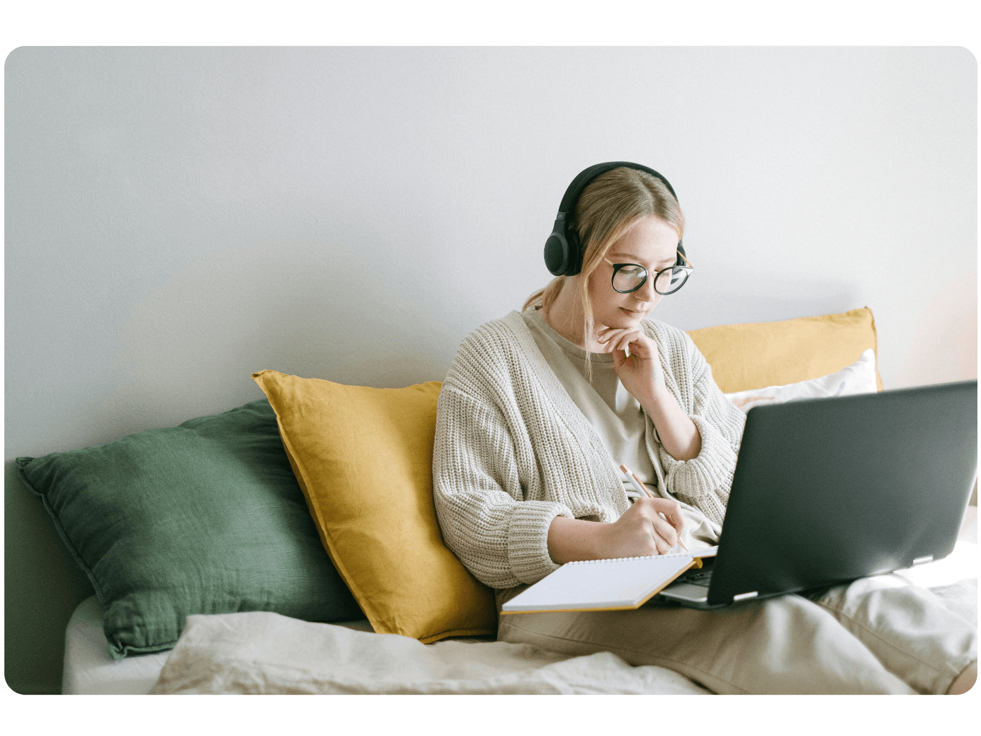 A person using a laptop and engaged in communication with an AI.